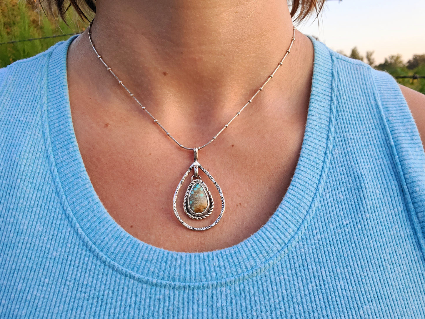 Elegant Number Eight Turquoise Pendant