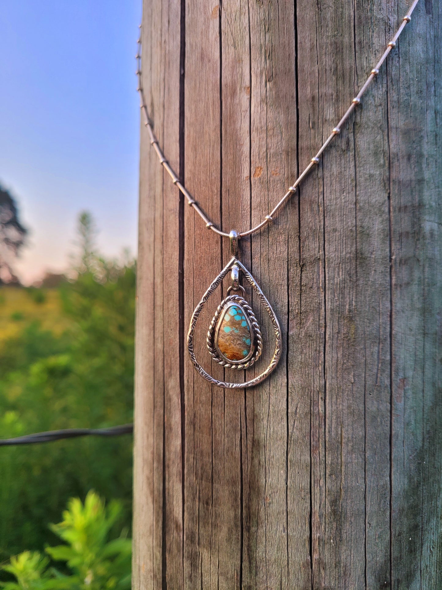 Elegant Number Eight Turquoise Pendant