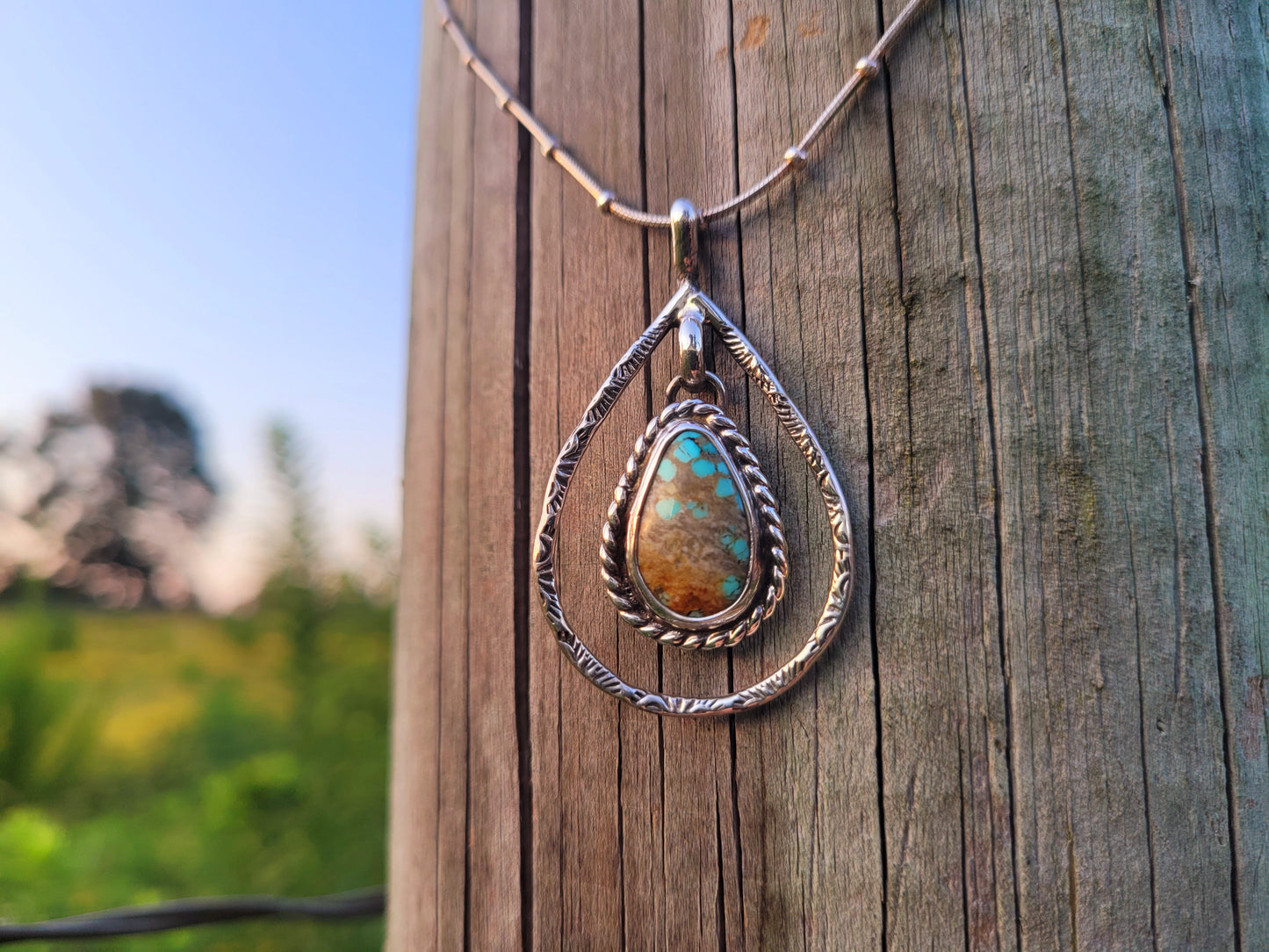 Elegant Number Eight Turquoise Pendant
