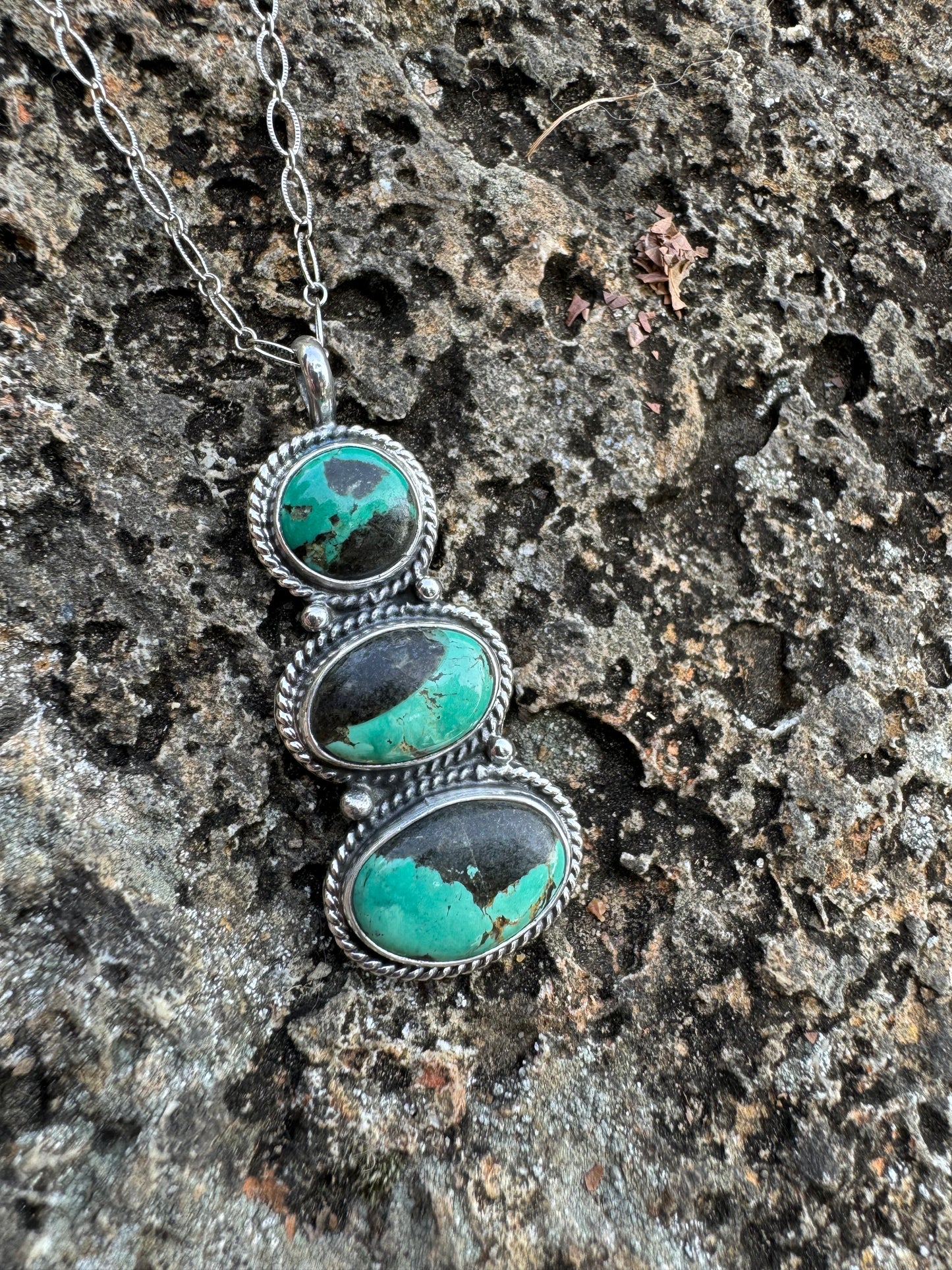 Three stone Tyrone turquoise pendant