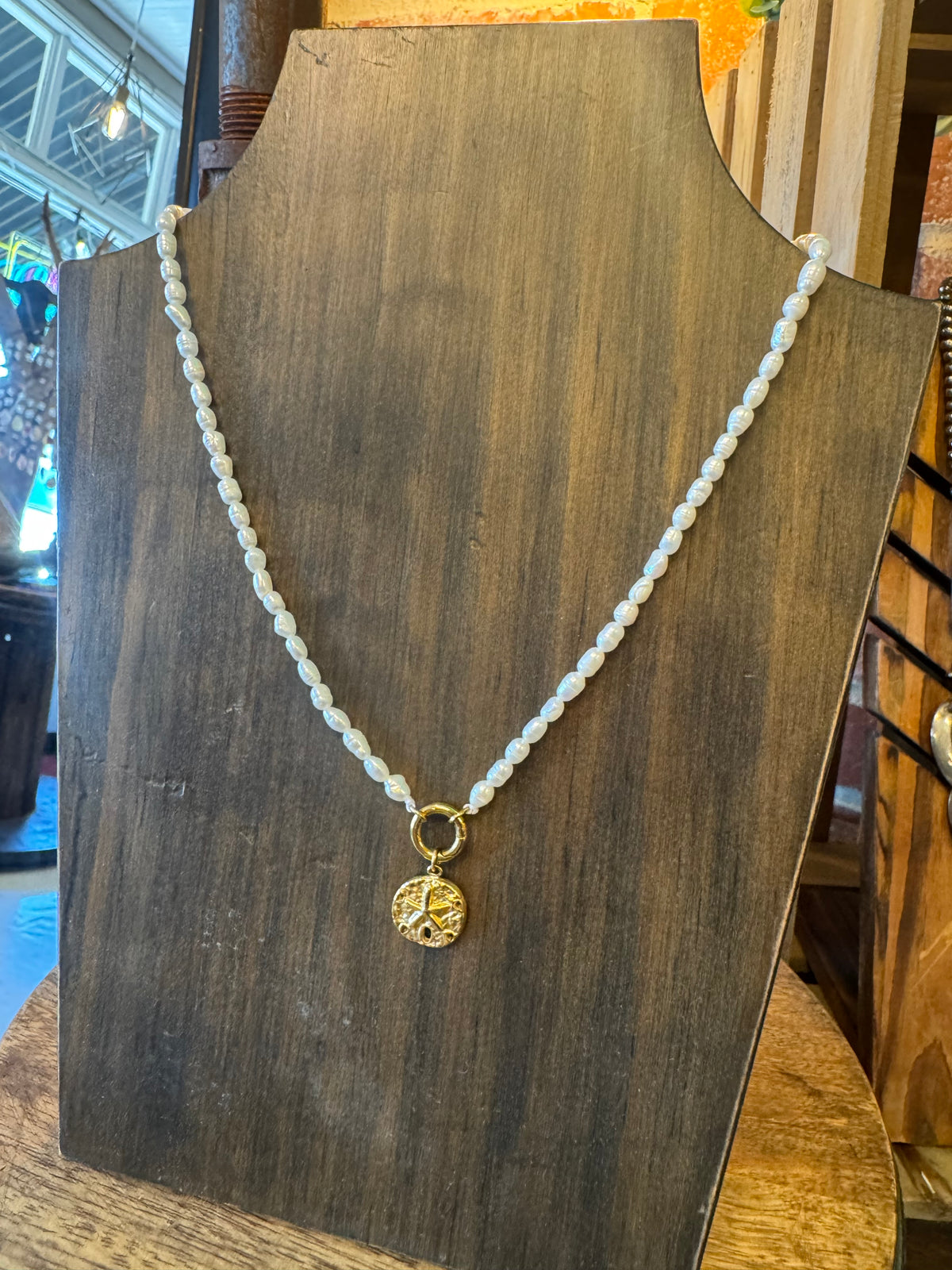 Freshwater pearl and Sand dollar