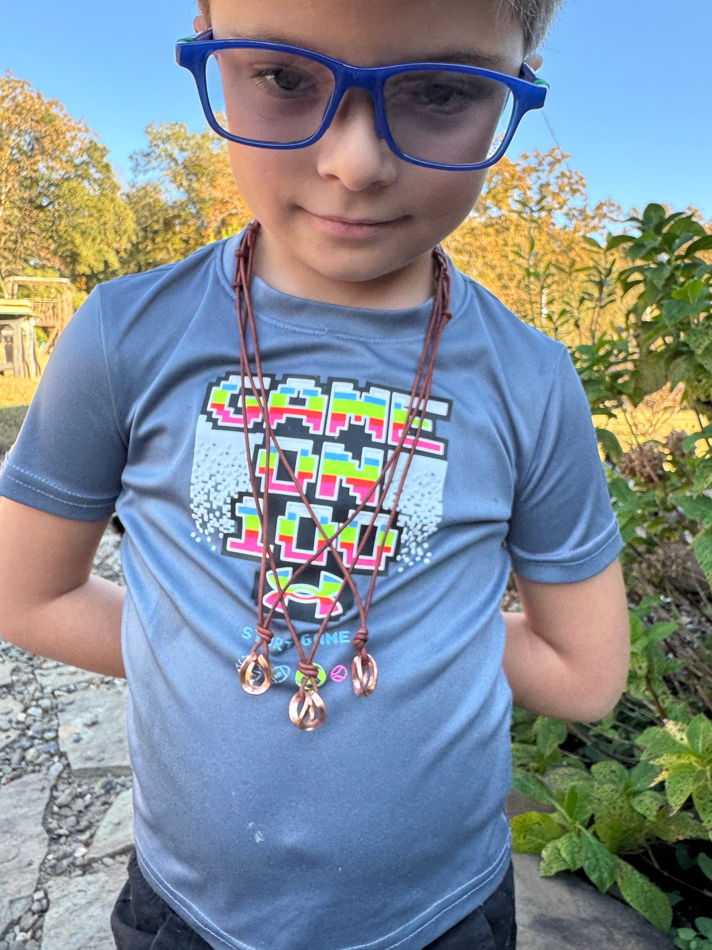 Copper and leather adjustable necklace made by Logan