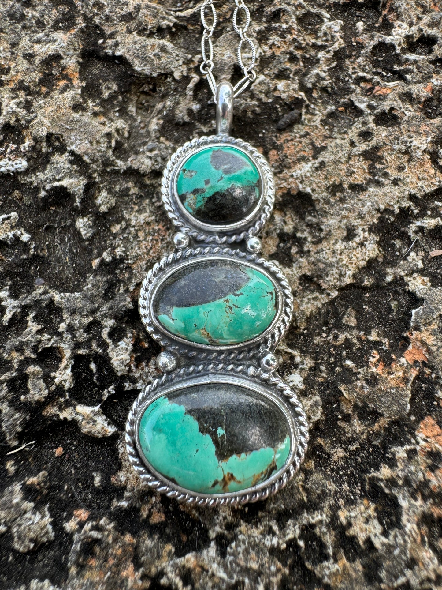 Three stone Tyrone turquoise pendant
