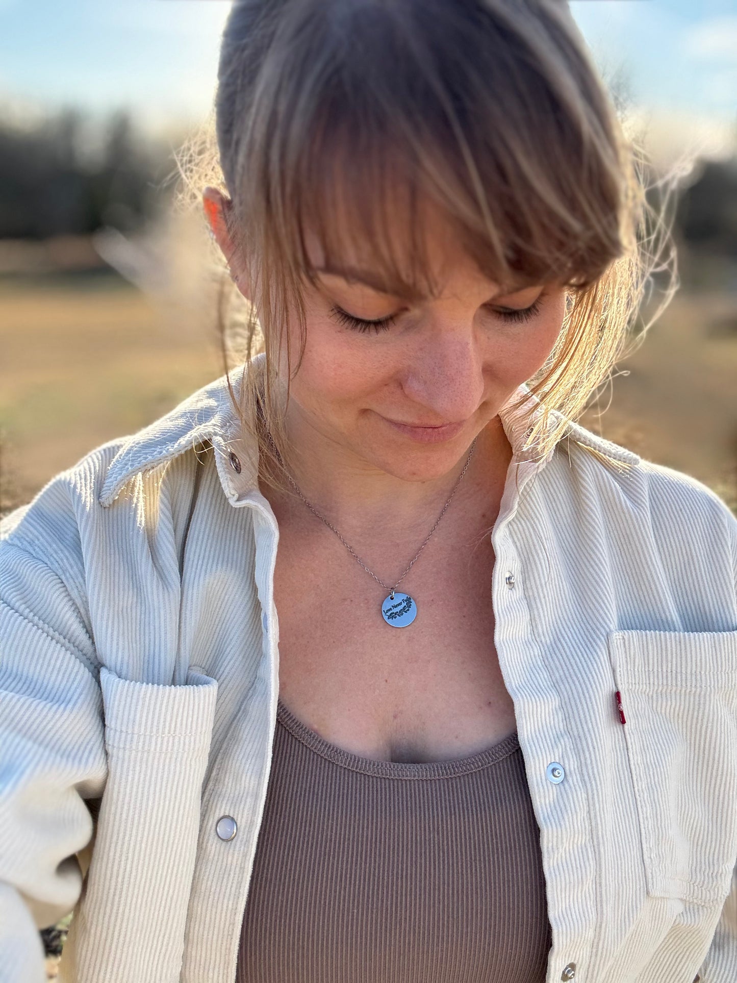 Love Never Fails Stainless Steel Necklace