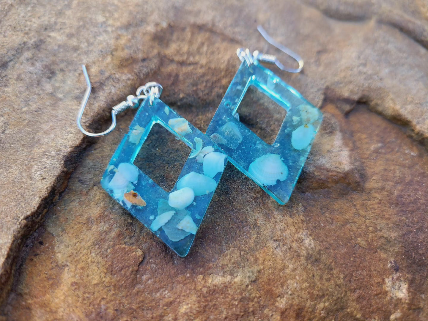 Resin seashell earrings by Gracie
