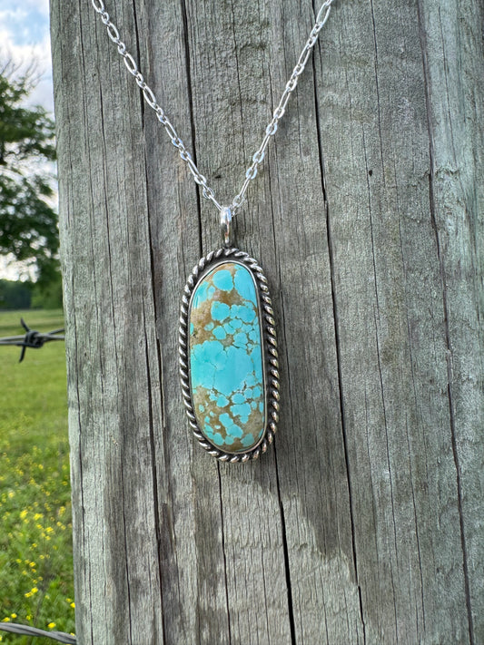 Number eight turquoise pendant