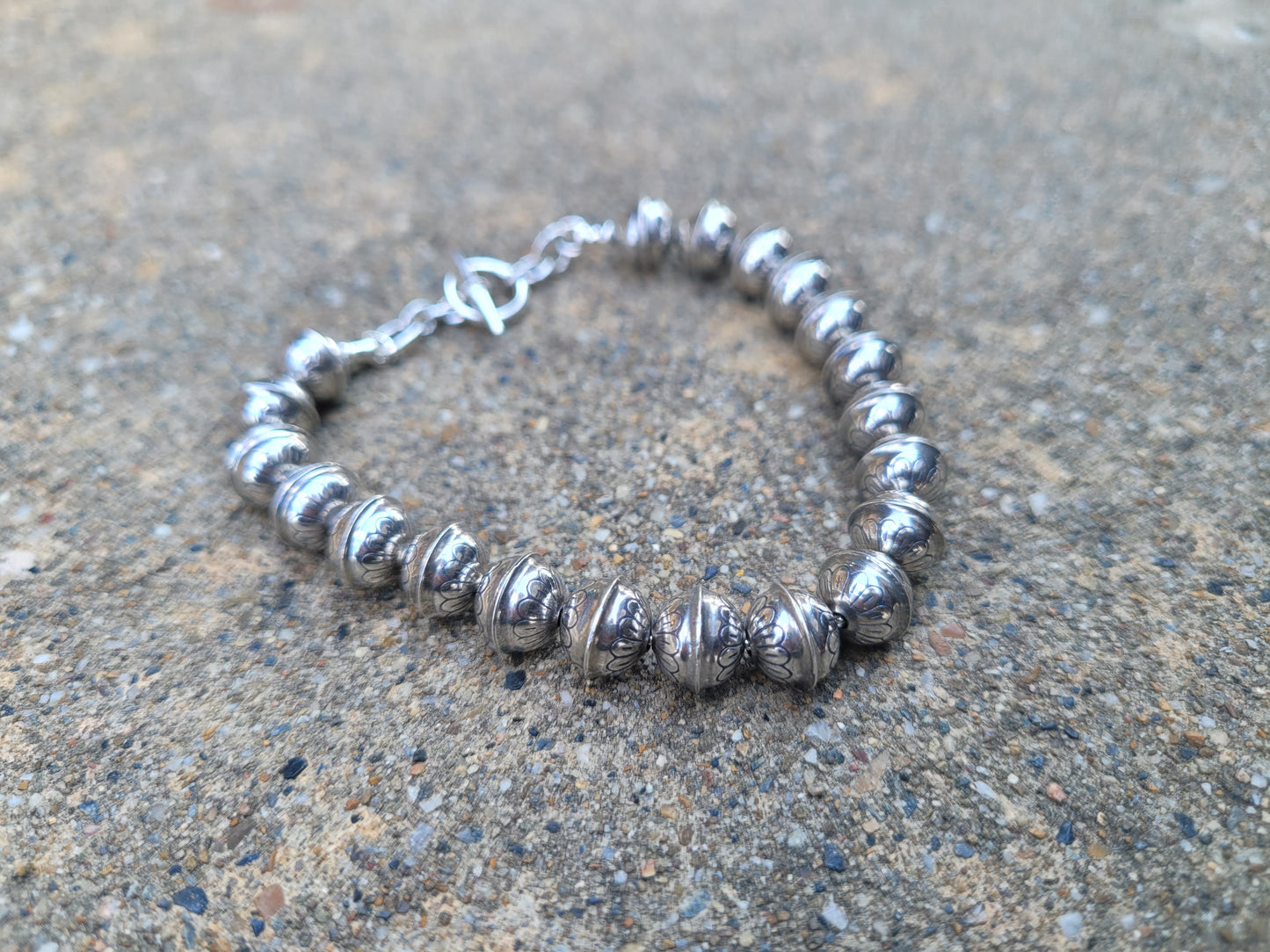 Solid sterling silver stamped Navajo pearl bracelet