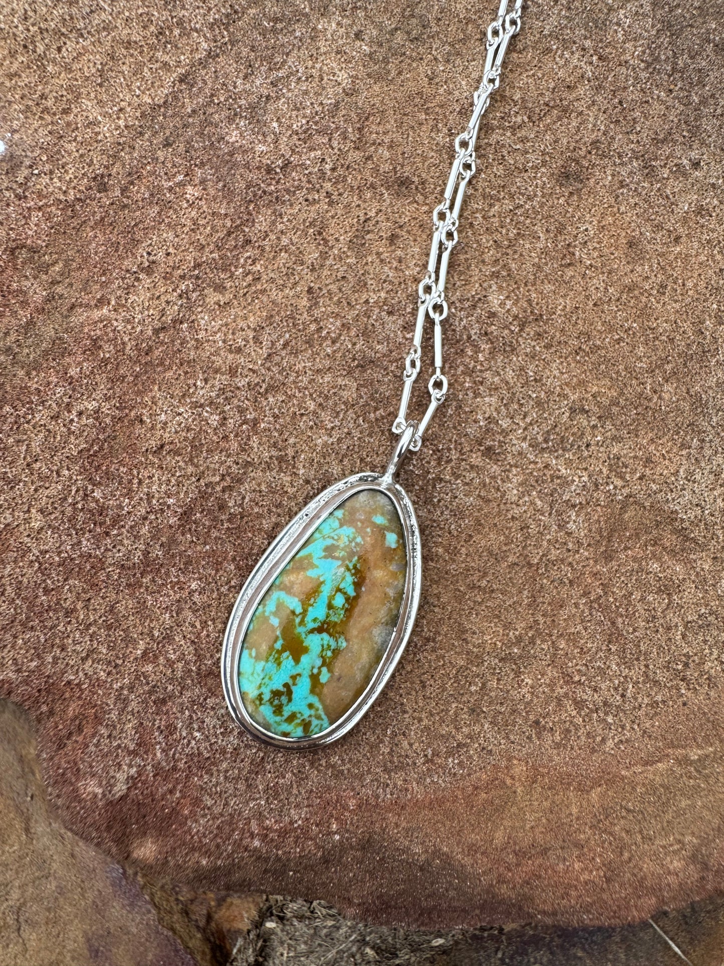 Brown Matrix Tyrone turquoise pendant