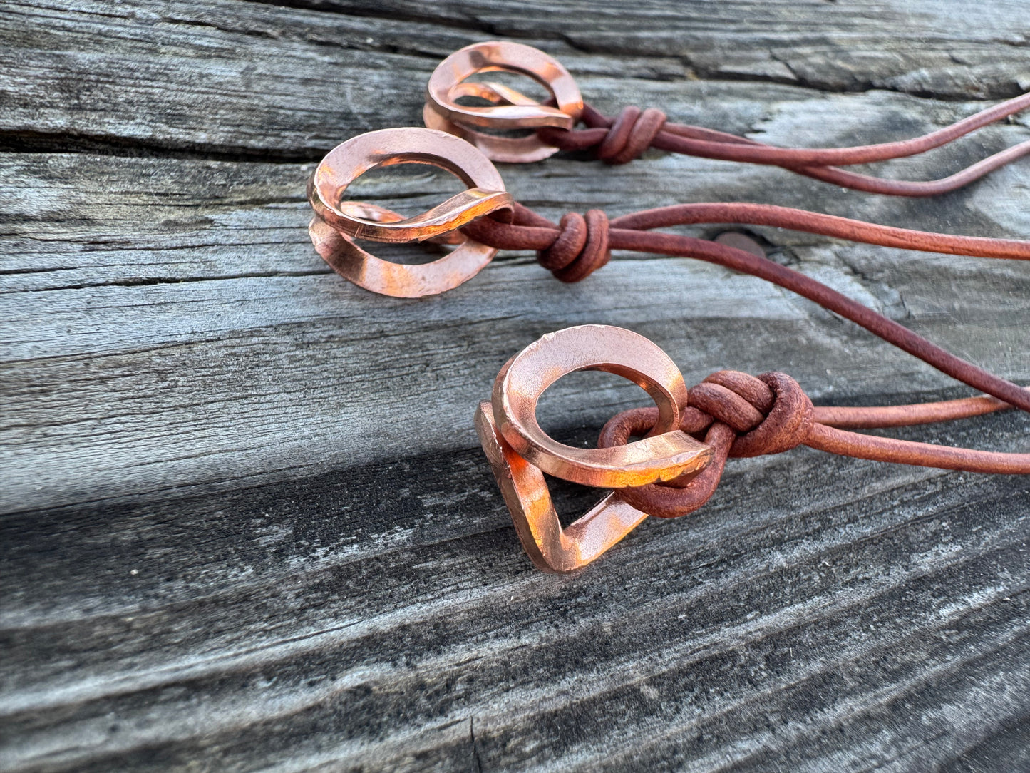 Copper and leather adjustable necklace made by Logan