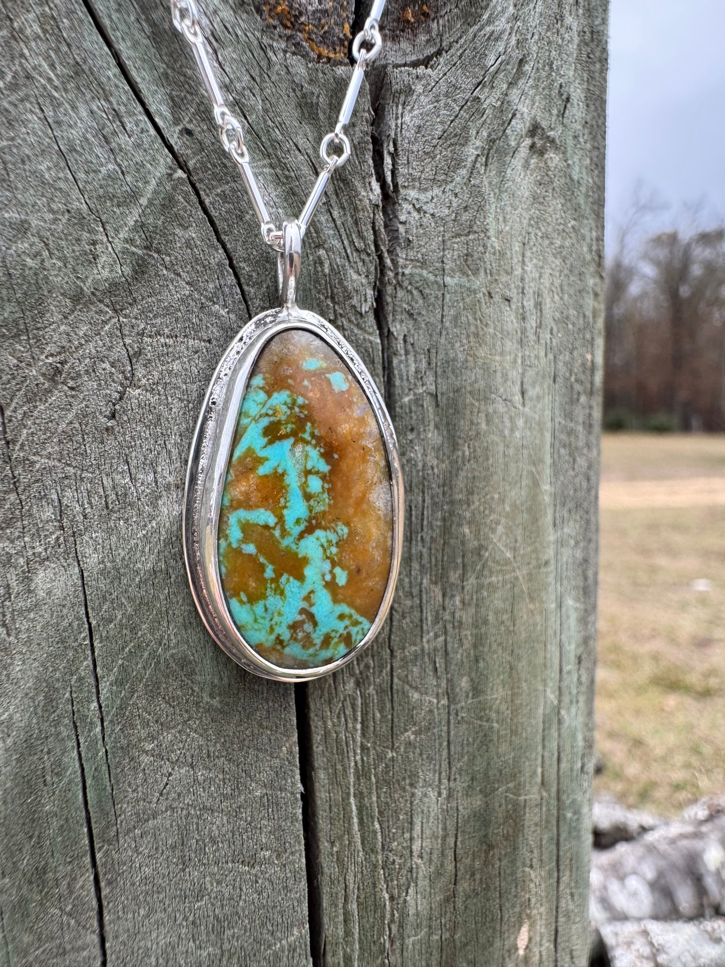 Brown Matrix Tyrone turquoise pendant