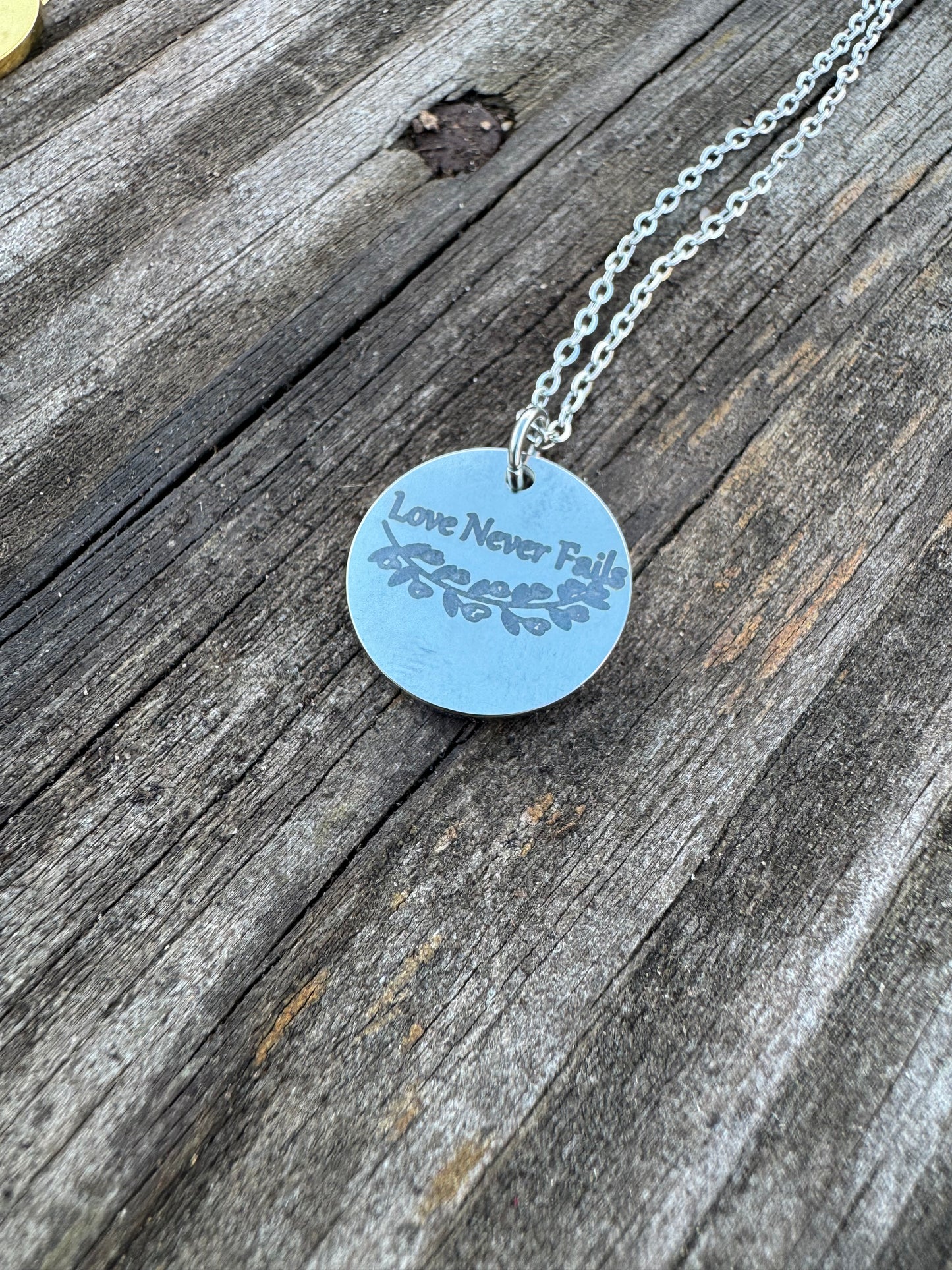 Love Never Fails Stainless Steel Necklace
