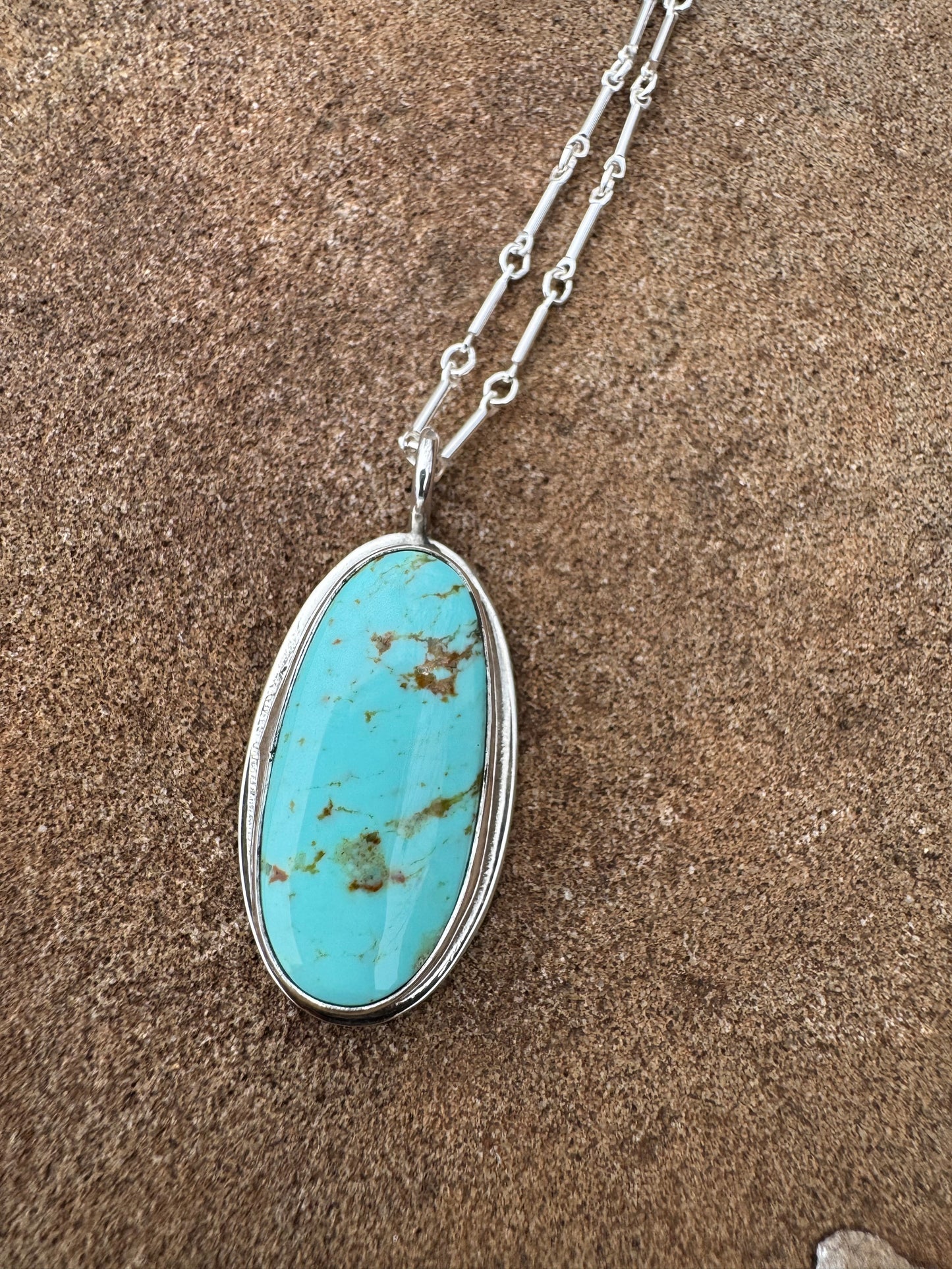 Light blue Tyrone turquoise pendant