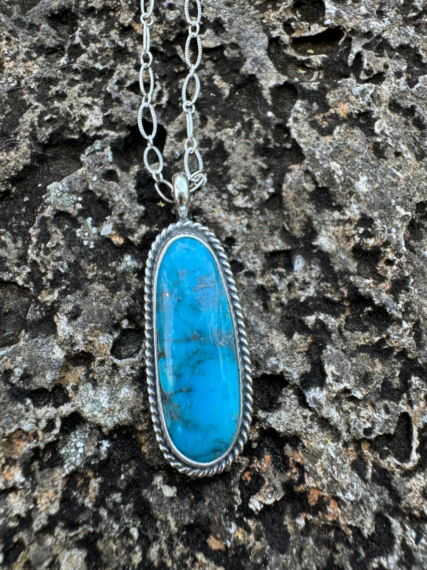 Bright blue Kingman turquoise pendant