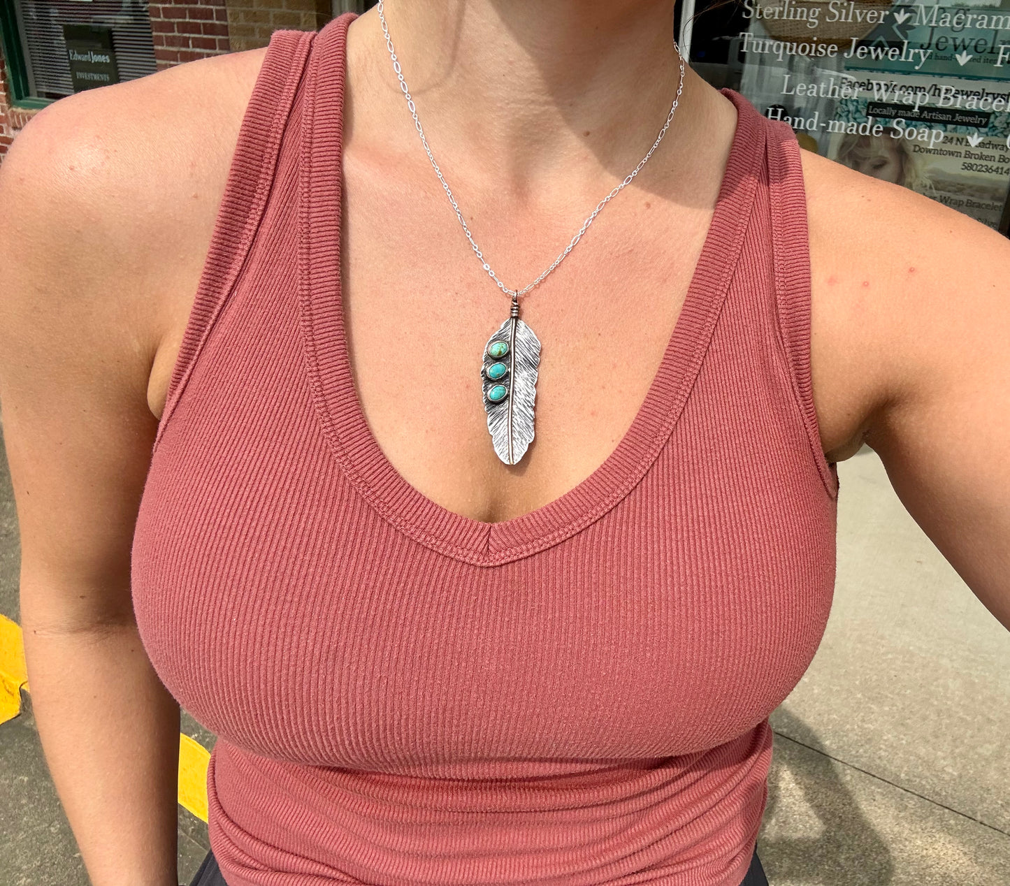 Turquoise handmade feather pendant