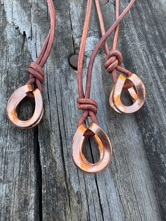 Copper and leather adjustable necklace made by Logan