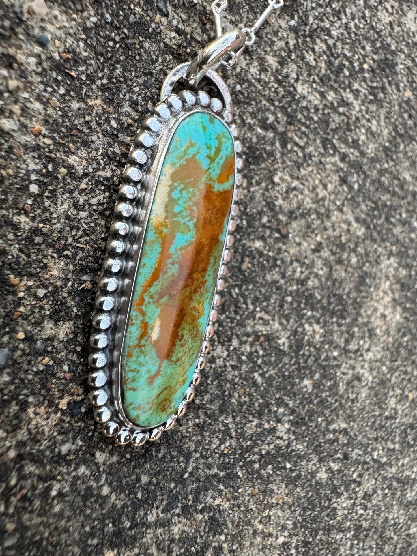 Long Tyrone turquoise beaded detail pendant