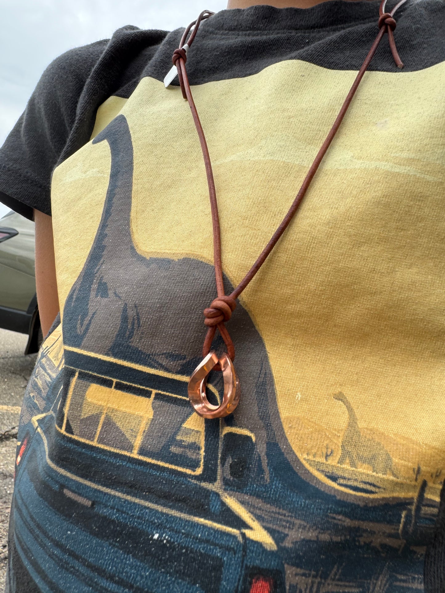 Copper and leather adjustable necklace made by Logan