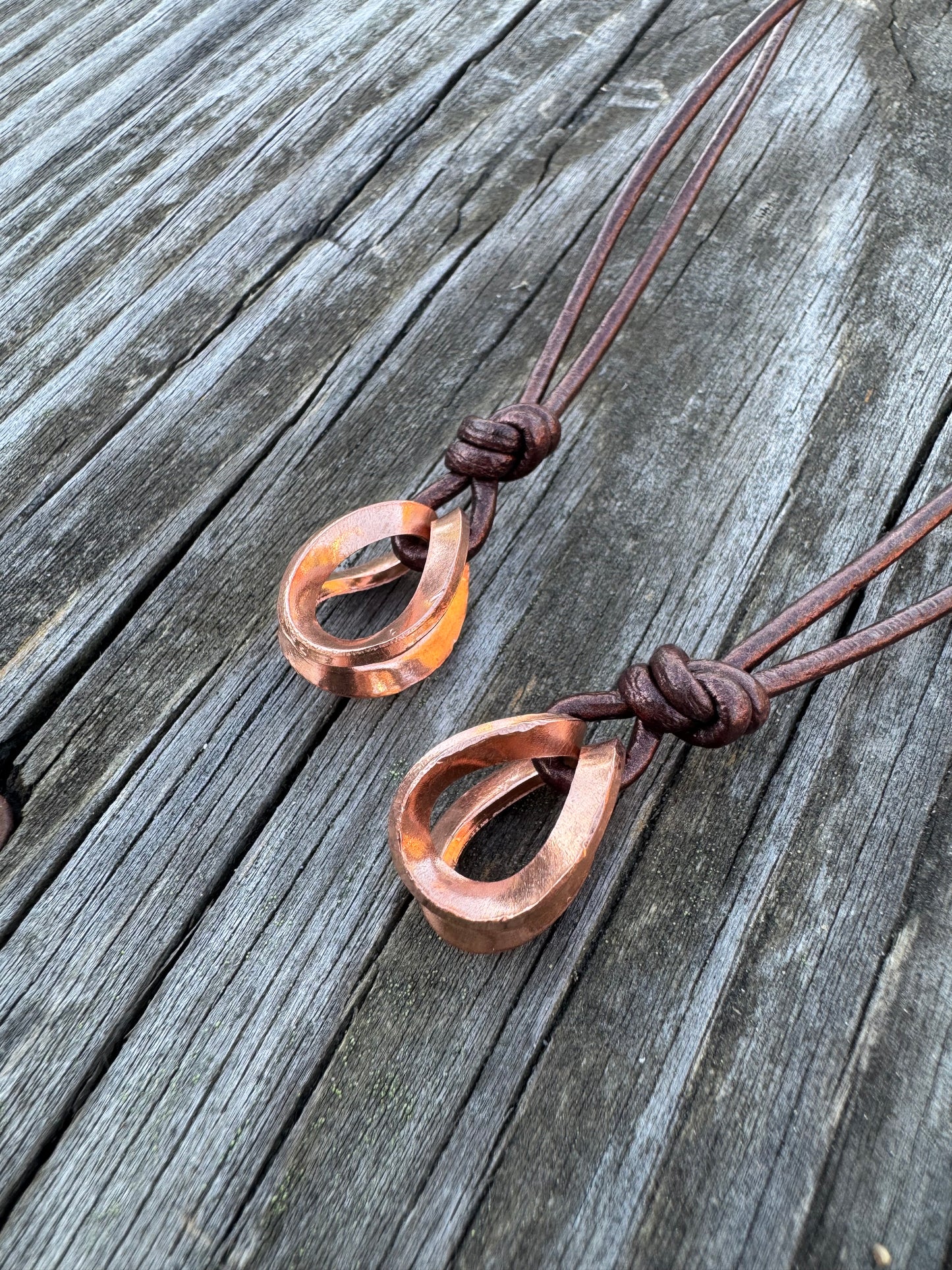 Copper and metallic Leather necklaces made by Logan
