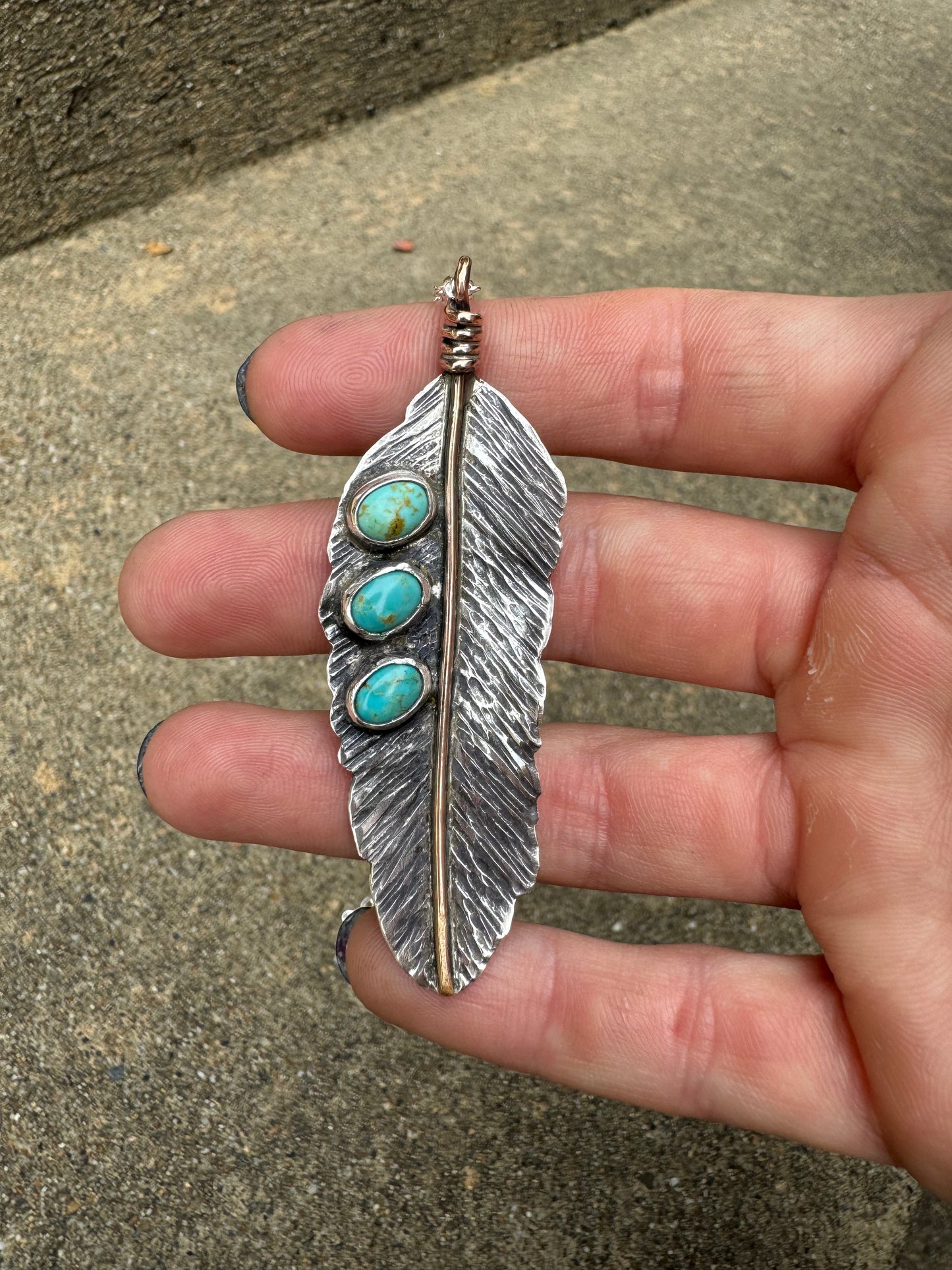 Turquoise handmade feather pendant