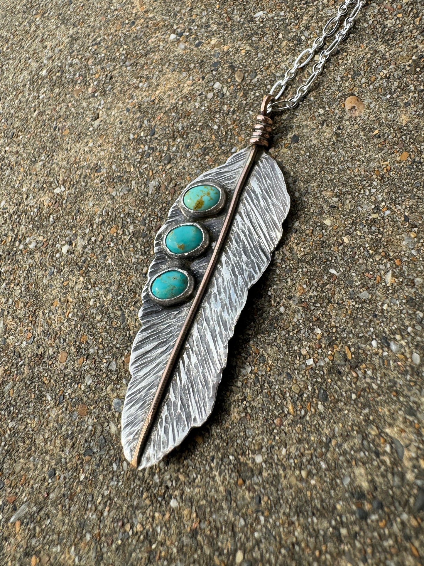 Turquoise handmade feather pendant