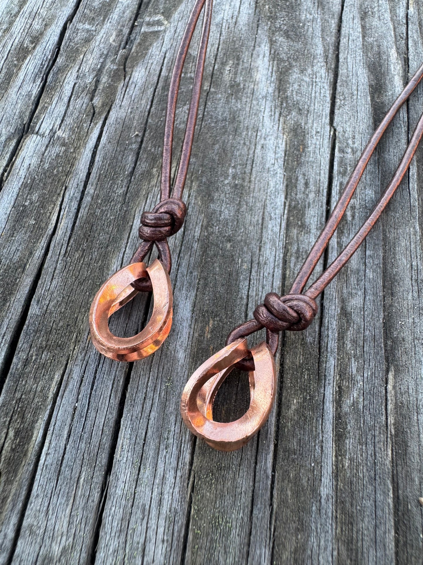 Copper and metallic Leather necklaces made by Logan