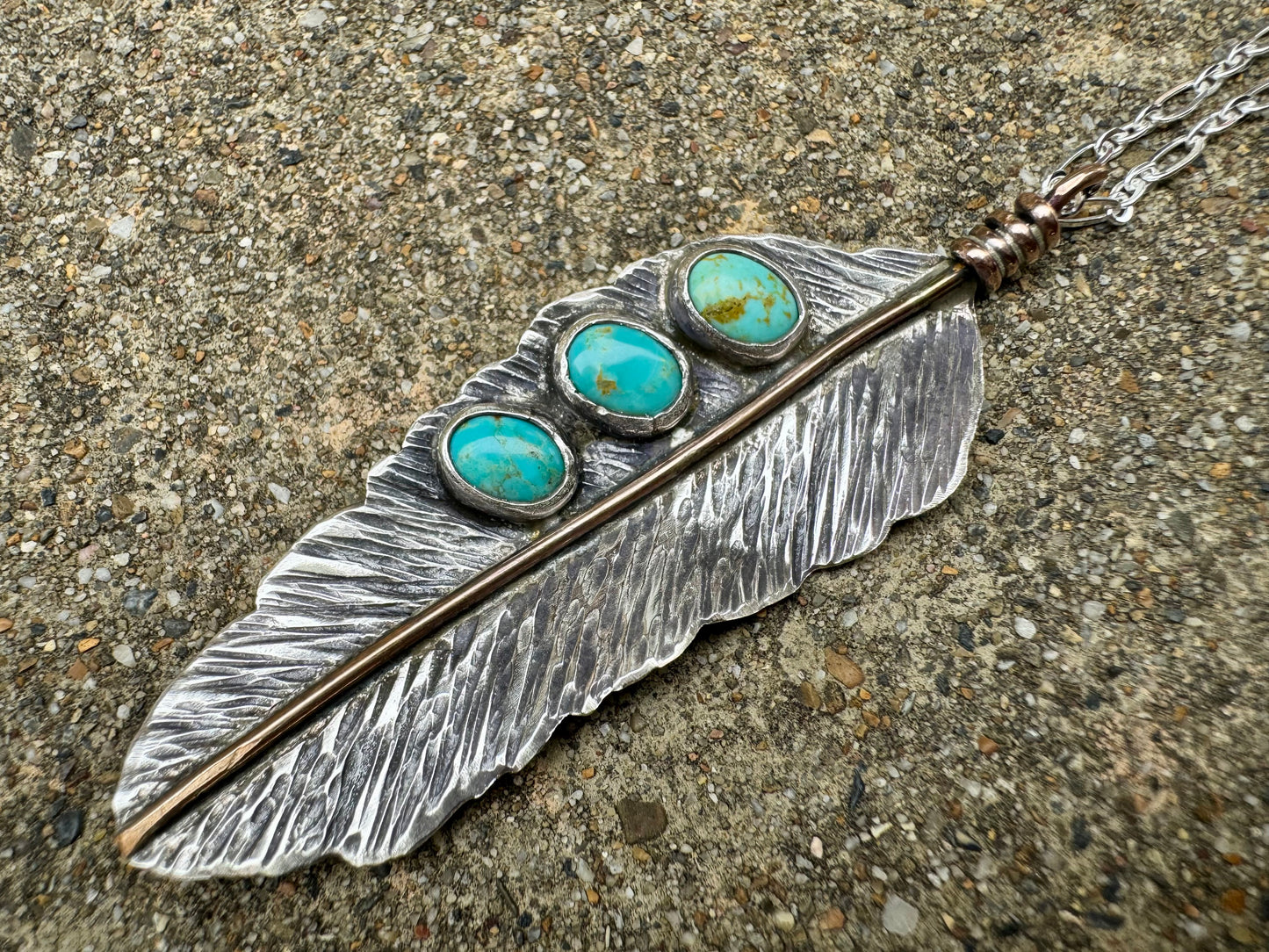 Turquoise handmade feather pendant