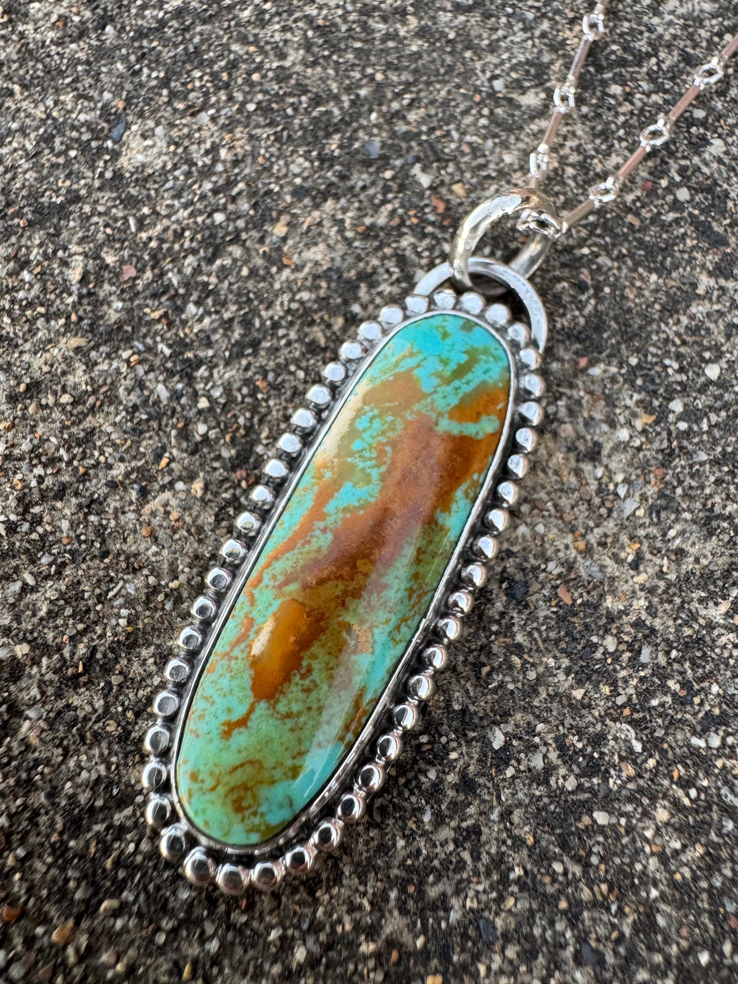 Long Tyrone turquoise beaded detail pendant