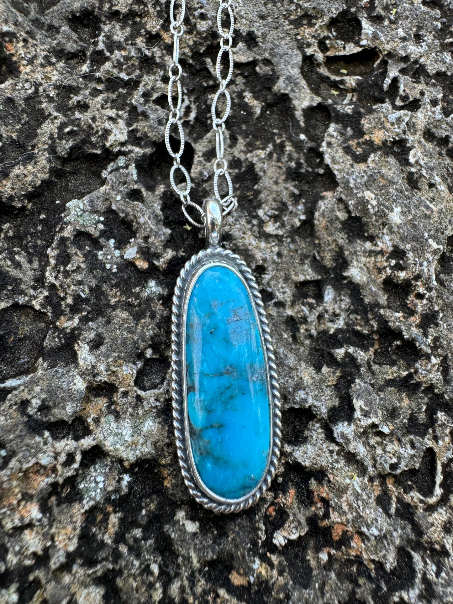 Bright blue Kingman turquoise pendant